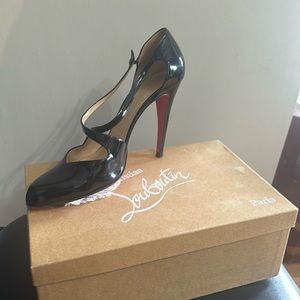 Christian Louboutin original with original packaging and Neiman Marcus receipt